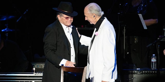 (L-R) Musicians Micky Dolenz and Michael Nesmith of the Monkees perform onstage during the final show of ‘The 55th Anniversary Farewell Tour’ at The Greek Theatre on November 14, 2021 in Los Angeles, California. 