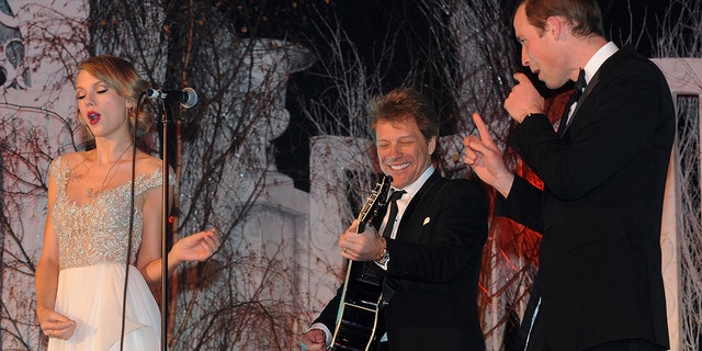 Taylor Swift, Jon Bon Jovi and Prince William, Duke of Cambridge perform during the Winter Whites Gala In Aid Of Centrepoint on November 26, 2013, in London, England. 