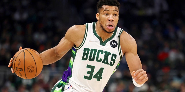 Milwaukee Bucks forward Giannis Antetokounmpo came back from health and safety protocols for the team's Christmas Day game.