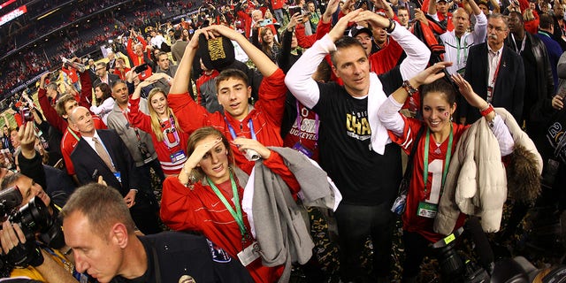 Head coach Urban Meyer of the Ohio State Buckeyes celebrates after defeating the Oregon Ducks, 42-20, in the College Football Playoff National Championship Game Jan. 12, 2015 in Arlington, Texas. 