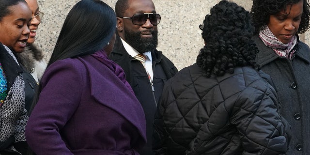 FILE 2019: Metropolitan Correctional Center guard Michael Thomas leaves Federal Court in New York City. (Photo by TIMOTHY A. CLARY / AFP) (Photo by TIMOTHY A. CLARY/AFP via Getty Images)