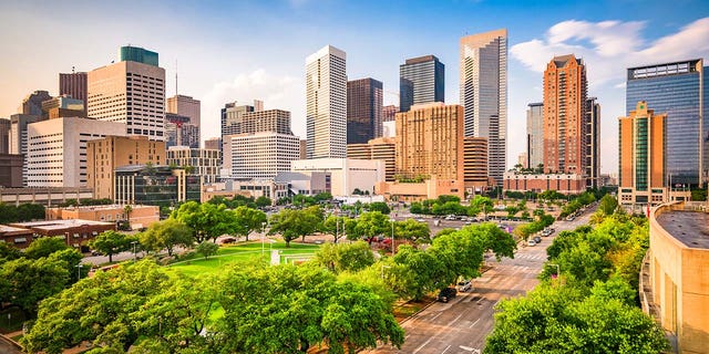 Houston, Texas, USA downtown skyline on Root Square.