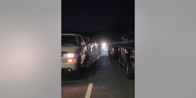 Hundreds of cars lined up outside Fort Benning Thursday, waiting to be let inside at midnight so the families can pick up their soldiers for holiday block leave.