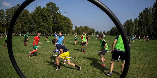 People practice quidditch during a boot camp organized by the Italian National Quidditch Team at Parco di Trenno on Sept. 8, 2018 in Milan, Italy.