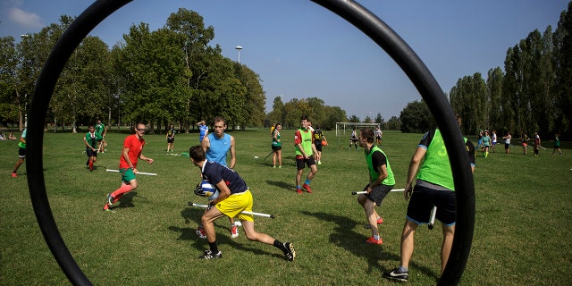 People practice quidditch during a boot camp organized by the Italian National Quidditch Team at Parco di Trenno on Sept. 8, 2018 in Milan, Italia.
