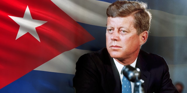 In this photo illustration, John F. Kennedy is shown at his desk in the White House on his first day in office as president of the United States.