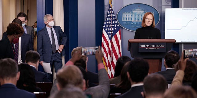 Dr. Anthony Fauci and Jen Psaki at the daily press briefing at the White House on December 01, 2021 in Washington, DC.