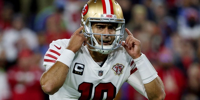 Jimmy Garoppolo of the San Francisco 49ers calls out instructions in the first quarter against the Tennessee Titans at Nissan Stadium Dec. 23, 2021, in Nashville.