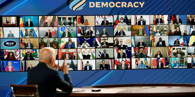 President Biden speaks from the South Court Auditorium on the White House complex in Washington, Thursday, Dec. 9, 2021, for the opening of the Democracy Summit. 