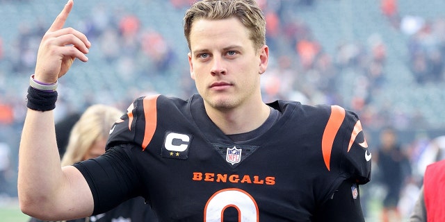 Joe Burrow #9 of the Cincinnati Bengals walks off the field after a win over the Baltimore Ravens at Paul Brown Stadium on December 26, 2021 in Cincinnati, Ohio.