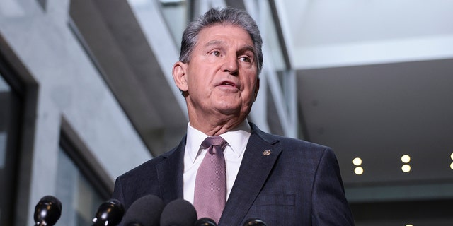 WASHINGTON, DC - OCTOBER 06: Sen. Joe Manchin (D-WV) speaks at a press conference outside his office on Capitol Hill on October 06, 2021 in Washington, DC. Manchin spoke on the debt limit and the infrastructure bill.
