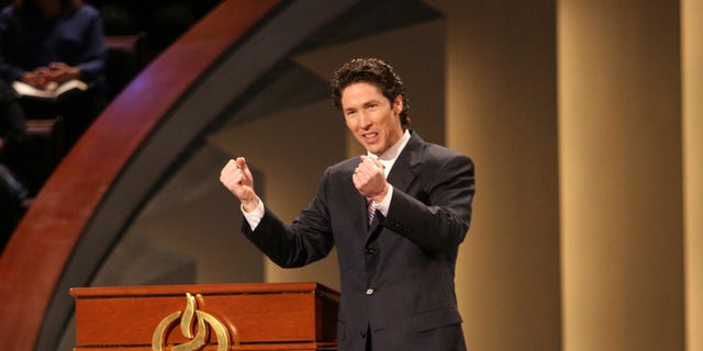 During services at Lakewood Church in Houston, Pastor Joel Osteen preaches to some 25,000 people each week. (Photo by Timothy Fadek/Corbis via Getty Images)