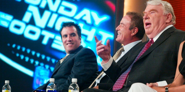 John Madden (right) play-by-play announcer for ABC's "NFL Monday Night Football" and fellow announcer Al Michaels (center) along with producer Fred Gaudelli (left) discuss Madden joining the team for the program in for the fall 2002 television schedule during the ABC Summer press tour.