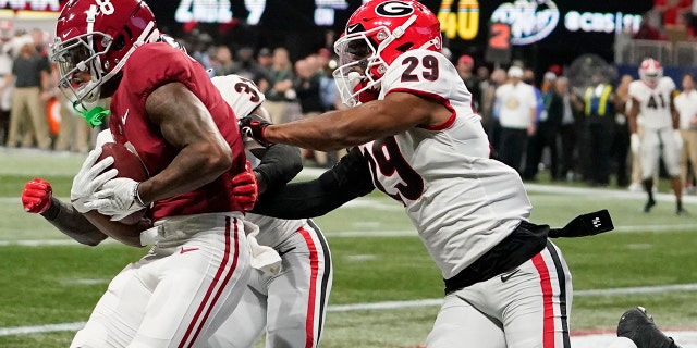 Alabama wide receiver John Metchie III makes a touchdown catch against Georgia during the Southeastern Conference championship on Saturday, Dec. 4, 2021, in Atlanta.