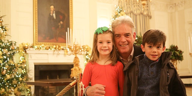 Roberts with his twins, Sage and Kellan, at the White House at Christmastime — another of the photos (along with memories, traditions, recipes, and more) that are featured in ‘All American Christmas.’ Roberts says he cherishes making new Christmas memories each year with his kids and wife Kyra.