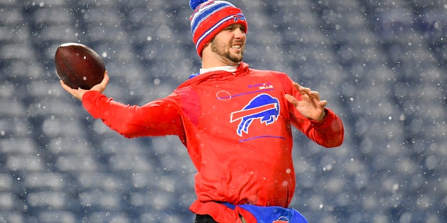 Dec 6, 2021; Orchard Park, New York, USA; Buffalo Bills quarterback Josh Allen (17) warms up prior to the game against the New England Patriots at Highmark Stadium.