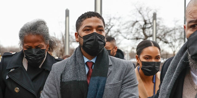 Jussie Smollett arrives with his mother Janet Smollett (L) at the Leighton Criminal Court Building for his trial on disorderly conduct charges.