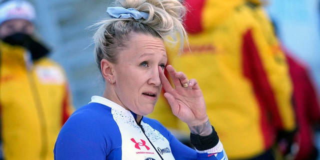 Kaillie Humphries of the United States is monitoring the leaderboard after the two women's bobsleigh world cup race in Igles near Innsbruck, Austria, on Sunday, November 21, 2021.