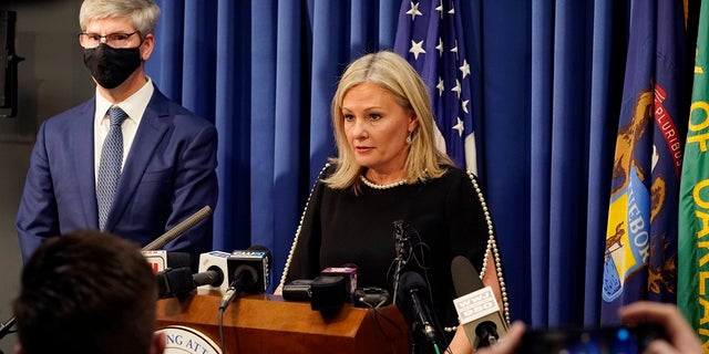 Oakland County prosecutor Karen McDonald addresses the media in her office, on Friday in Pontiac, Mich.  (AP Photo/Carlos Osorio)