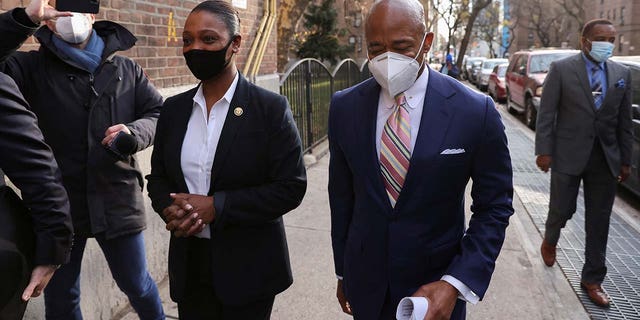 The-incoming New York City Mayor Eric Adams and the-Nassau County Chief of Detectives Keechant Sewell arrive for a ceremony in which she was announced as the first ever female NYPD Commissioner, in Queensbridge Houses, Queens, New York City, U.S., December 15, 2021. 