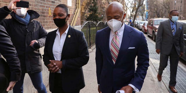 The-incoming New York City Mayor Eric Adams and the-Nassau County Chief of Detectives Keechant Sewell arrive for a ceremony in which she was announced as the first ever female NYPD Commissioner, in Queensbridge Houses, Queens, New York City, U.S., December 15, 2021.