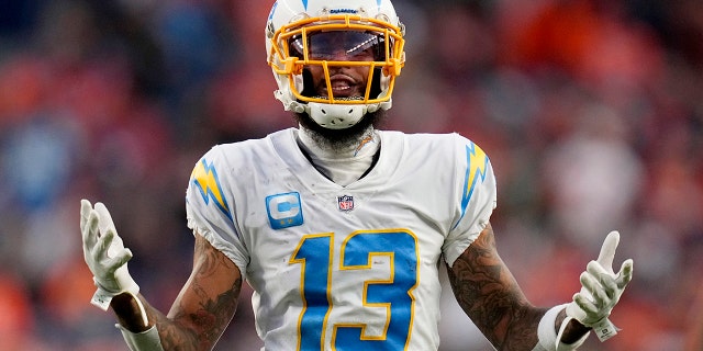 Los Angeles Chargers wide receiver Keenan Allen (13) looks for a call from the referee against the Denver Broncos during the second half of an NFL football game, Sunday, Nov. 28, 2021, in Denver.