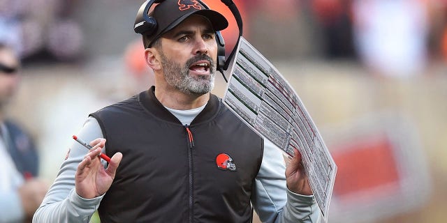 FILE - Cleveland Browns head coach Kevin Stefanski reacts during the second half of an NFL football game against the Baltimore Ravens, Sunday, Dec. 12, 2021, in Cleveland.  Quarterback Baker Mayfield and Stefanski tested positive for COVID-19 on Wednesday, Dec. 15,  and will likely miss Saturday’s game against the Las Vegas Raiders as Cleveland deals with a widespread outbreak during its playoff pursuit.