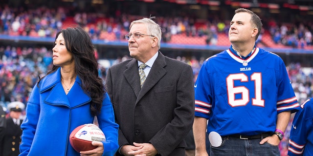Buffalo Bills owners Kim and Terry Pegula honor the family of Buffalo Bills offensive lineman Bob Kalsu, who was killed in the Vietnam War, before the game on Nov. 27, 2016, at New Era Field in Orchard Park, New York.
