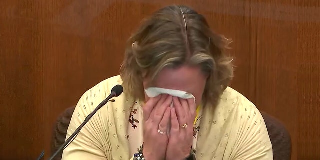 Former Brooklyn Center Police Officer Kim Potter becomes emotional as she testifies in court, Friday, Dec. 17, 2021 at the Hennepin County Courthouse in Minneapolis, Minnesota. 