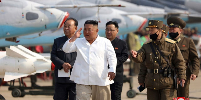 In this undated file photo provided by the North Korean government on April 12, 2020, North Korean leader Kim Jong Un inspects an air defense unit in western area, North Korea. 