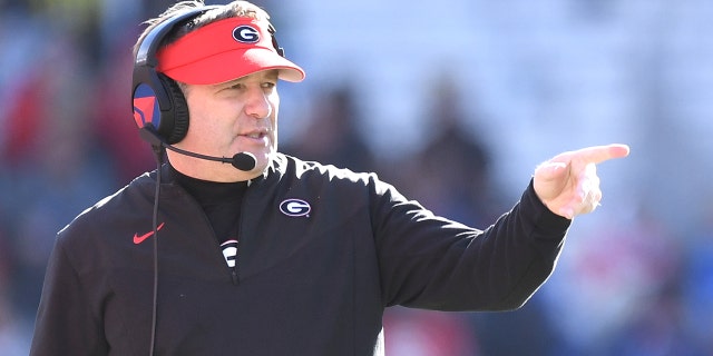 Head coach Kirby Smart of the Georgia Bulldogs gestures on the sidelines during the fourth quarter against the Georgia Tech Yellow Jackets at Bobby Dodd Stadium on November 27, 2021 in Atlanta, Georgia.