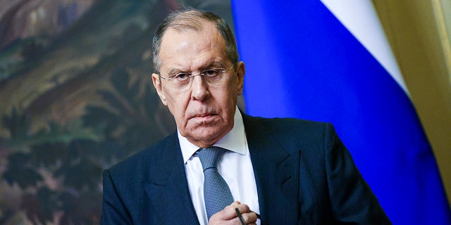 In this photo released by the Russian Foreign Ministry Press Service, Russian Foreign Minister Sergey Lavrov pauses during his and Brazilian Foreign Minister Carlos Franca's joint news conference following their talks in Moscow, Russia, Tuesday, Nov. 30, 2021. 