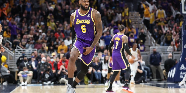 INDIANAPOLIS, INDIANA - NOVEMBER 24: LeBron James #6 of the Los Angeles Lakers celebrates in the 124-116 OT win against the Indiana Pacers at Gainbridge Fieldhouse on November 24, 2021 in Indianapolis, Indiana.
