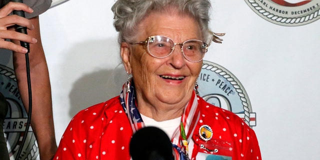 Mae Krier, who worked at a Boeing plant during the war, speaks at a news conference in Pearl Harbor, Hawaii, on Sunday, Dec. 5, 2021. 