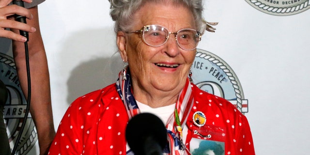 Mae Krier, who worked at a Boeing plant during the war, speaks at a news conference in Pearl Harbor, Hawaii, on Sunday, Dec. 5, 2021.