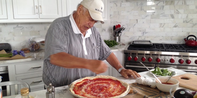 Maria Bartiromo's dad, Vincent, made "amazing pizza," she says in the new book ‘All American Christmas.’ This photo of him hard at work in the kitchen, plus many other photos, essays, recipes, and more, appear in the book by Rachel Campos-Duffy and Sean Duffy.