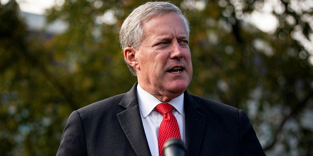 FILE PHOTO: White House Chief of Staff Mark Meadows speaks to reporters following a television interview, outside the White House in Washington, Oct. 21, 2020. REUTERS/Al Drago/File Picture/File Photo