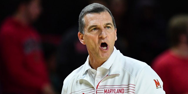 Maryland head coach Mark Turgeon calls a play to his team during the first half of an NCAA college basketball game against Hofstra, Friday, Nov. 19, 2021, in College Park, Md.