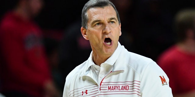 Maryland head coach Mark Turgeon calls a play to his team during the first half of an NCAA college basketball game against Hofstra, Friday, Nov. 19, 2021, in College Park, Md.