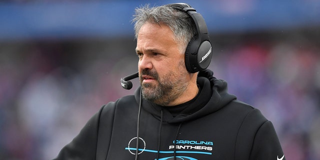 Carolina Panthers head coach Matt Rhule works the sidelines in the first half of an NFL football game against the Buffalo Bills, Sunday, Dec. 19, 2021, in Orchard Park, N.Y.
