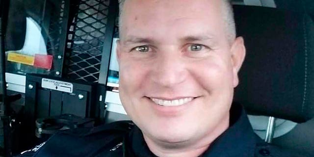 Mesquite Officer Richard Houston was killed Friday while responding to a disturbance call outside a suburban Dallas supermarket. (Family Photo/Courtesy of Mesquite Police Department via AP)