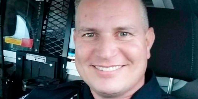 Mesquite Officer Richard Houston was killed Friday while responding to a disturbance call outside a suburban Dallas supermarket. (Family Photo/Courtesy of Mesquite Police Department via AP)