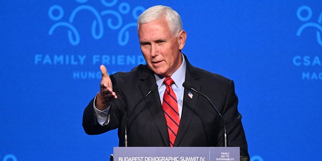 Former Vice President Mike Pence gives a speech on the stage of the Varkert Bazar cultural centre in Budapest on Sept. 23, 2021, during the fourth demographic summit. 