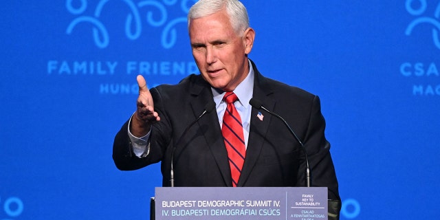 Former Vice President Mike Pence gives a speech on the stage of the Varkert Bazar cultural centre in Budapest on Sept. 23, 2021.