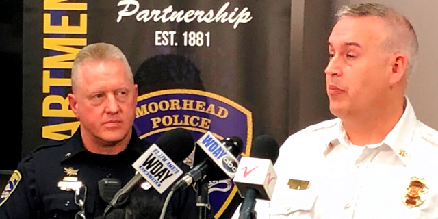Officials from Moorhead, Minnesota, appeared at a news conference on Dec. 22, 2021, to talk about the deaths of seven residents who died from carbon monoxide poisoning. A carbon monoxide detector in a garage had been removed and replaced with a smoke-only detector, but investigators had not found any evidence of criminal activity. 
