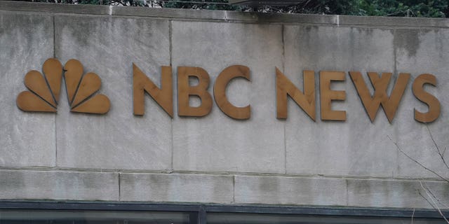 A sign is pictured outside NBC headquarters at Rockefeller Center in the Manhattan borough of New York City, New York, U.S., January 16, 2020. REUTERS/Carlo Allegri