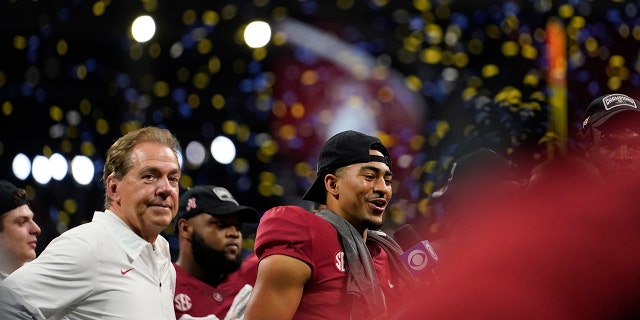 Alabama head coach Nick Saban and Alabama quarterback Bryce Young celebrate the teams win after the Southeastern Conference championship NCAA college football game between Georgia and Alabama, Saturday, Dec. 4, 2021, in Atlanta. Alabama won 41-24.