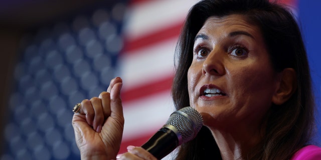 Nikki Haley, the former Governor of South Carolina and Ambassador to the UN, stumps for Virginia gubernatorial candidate Glenn Youngkin (R-VA), during a campaign event in McLean, Virginia, U.S., July 14, 2021. REUTERS/Evelyn Hockstein