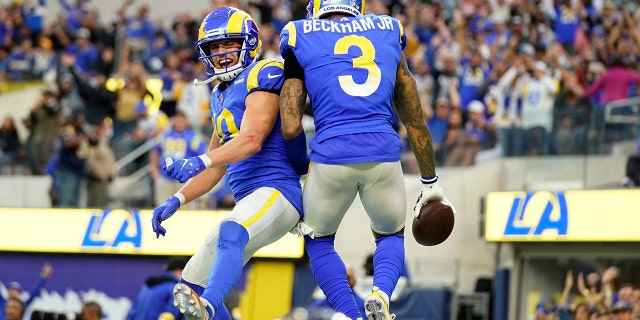 Los Angeles Rams wide receiver Odell Beckham Jr. (3) celebrates his touchdown catch with Cooper Kupp during the second half of an NFL football game against the Jacksonville Jaguars Sunday, Dec. 5, 2021, in Inglewood, Calif.