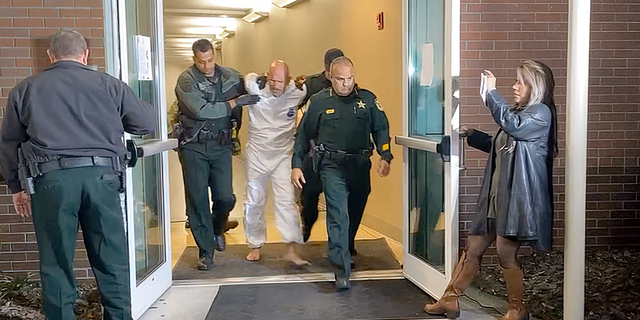 Figueroa denied the accusations during a profanity-laced rant as deputies escorted him from the sheriff's office to a patrol car Tuesday evening.